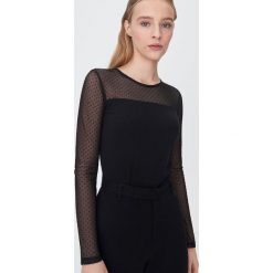 Bluzka z tkaniny plumeti - Czarny. Czarne bluzki damskie Sinsay, s, bez wzorów, z tkaniny, bez kołnierzyka, bez rękawów. W wyprzedaży za 19,99 zł.