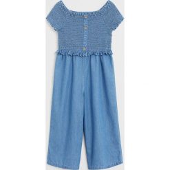 Mango Kids - Kombinezon dziecięcy Luna 110-164 cm. Niebieskie kombinezony dziewczęce Mango Kids, bez wzorów, z bawełny, z krótkim rękawem, krótkie. W wyprzedaży za 95,90 zł.