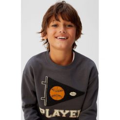 Mango Kids - Bluza dziecięca Pro 110-164 cm. Niebieskie bluzy chłopięce Mango Kids, z nadrukiem, z bawełny, bez rękawów, bez kaptura. Za 59,90 zł.