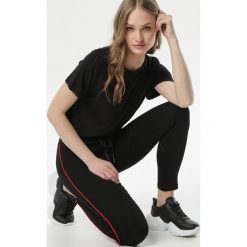 Czarno-Czerwone Legginsy Larigenia. Czarne legginsy damskie Born2be, s, bez wzorów, z gumy. Za 39,99 zł.