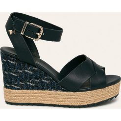 Tommy Hilfiger - Sandały skórzane. Żółte koturny damskie TOMMY HILFIGER, bez wzorów, ze skóry, bez obcasa, na obcasie. W wyprzedaży za 269,90 zł.