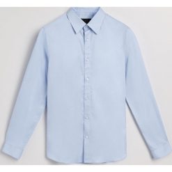 Koszula regular fit - Niebieski. Niebieskie koszule męskie na spinki Reserved, l. Za 139,99 zł.