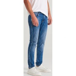 Jeansy slim z lampasami - Niebieski. Niebieskie jeansy męskie Reserved, m, bez wzorów. W wyprzedaży za 69,99 zł.