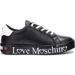 Love Moschino Tenisówki Czarny. Czarne trampki i tenisówki damskie Love Moschino, bez wzorów, ze skóry, bez zapięcia. Za 857,95 zł.