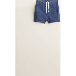 Mango Kids - Szorty dziecięce Bruno 80-104 cm. Niebieskie spodenki chłopięce Mango Kids, bez wzorów, z bawełny, casualowe. W wyprzedaży za 29,90 zł.