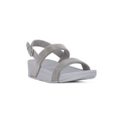 Sandały FitFlop FIT FLOP LOTTIE SHIMMERMESH SLIDE. Szare sandały damskie FitFlop, bez wzorów, bez obcasa, bez zapięcia. Za 395,74 zł.
