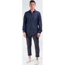 Trussardi Jeans koszula męska 44 ciemnoniebieski. Niebieskie koszule męskie Trussardi Jeans, m, bez wzorów, z jeansu, bez kołnierzyka, bez rękawów. W wyprzedaży za 349,00 zł.