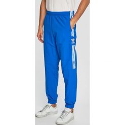 Adidas Originals - Spodnie. Niebieskie spodnie męskie adidas Originals, na co dzień, xl, bez wzorów, z poliesteru, casualowe. Za 249,90 zł.