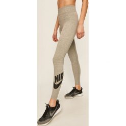 Nike Sportswear - Legginsy. Czarne spodnie damskie Nike Sportswear, s, z nadrukiem, z elastanu. Za 149,90 zł.