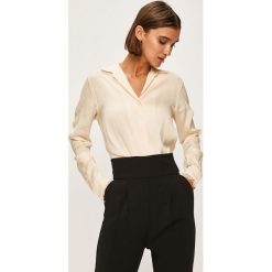 Calvin Klein - Koszula. Czarne bluzki damskie Calvin Klein, na co dzień, bez wzorów, z elastanu, eleganckie, z klasycznym kołnierzykiem, z długim rękawem. W wyprzedaży za 399,90 zł.