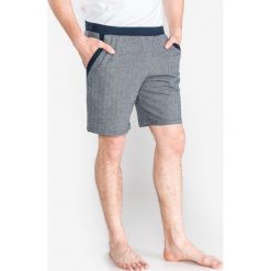 Emporio Armani Spodnie do spania Niebieski. Niebieskie spodnie męskie Emporio Armani, l, bez wzorów, z bawełny. Za 361,95 zł.