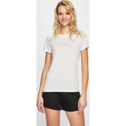 Reebok - Top. Białe topy damskie Reebok, s, bez wzorów, z poliesteru, z okrągłym kołnierzem. W wyprzedaży za 69,90 zł.