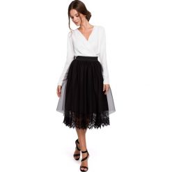 Spódnica z tiulem czarna - s. Czarne spódniczki damskie s, z poliesteru, eleganckie, długie, midi, rozkloszowane. Za 228,99 zł.