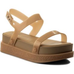 Sandały MELISSA - Koenji Ad 32240 Beige 01915. Brązowe klapki damskie Melissa, bez wzorów, z tworzywa sztucznego, bez obcasa. W wyprzedaży za 259,00 zł.