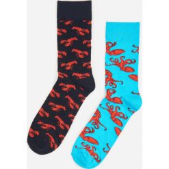 Wzorzyste skarpety 2 pack - Turkusowy. Niebieskie skarpetki męskie Reserved, bez wzorów. Za 24,99 zł.