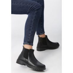 Czarne Botki Buckner. Czarne botki damskie Born2be, eleganckie, bez obcasa, na płaskiej podeszwie, bez zapięcia. Za 139,99 zł.