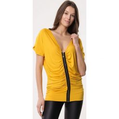 Żółta Bluzka Solidity. Żółte bluzki damskie Born2be, xl, bez wzorów, z dzianiny, bez kołnierzyka, z krótkim rękawem. Za 19,99 zł.