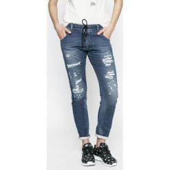 Diesel - Jeansy. Niebieskie jeansy damskie z wysokim stanem marki Diesel, z elastanu. W wyprzedaży za 599,90 zł.