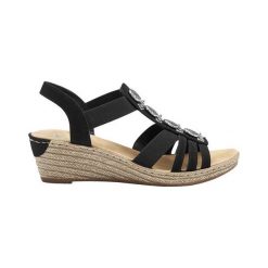 Rieker Sandały czarny female czarny 37. Czarne koturny damskie Rieker, w paski, z syntetyku, eleganckie, bez obcasa, na koturnie, z paskami. Za 239,00 zł.