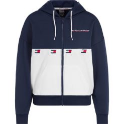 Bluza Tommy Sport S10S100229. Niebieskie bluzy sportowe damskie Tommy Sport, s, bez wzorów, z elastanu, bez rękawów, bez kaptura. W wyprzedaży za 289,00 zł.