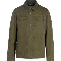 Kurtka jeansowa Tommy Jeans Tjm Cargo DM0DM06489. Zielone kurtki męskie Tommy Jeans, m, bez wzorów, z jeansu, bez kaptura. W wyprzedaży za 449,00 zł.