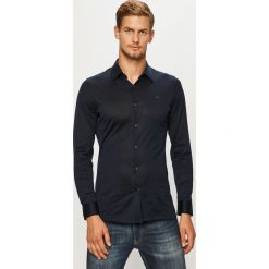 Lacoste - Koszula. Czarne koszule męskie Lacoste, s, bez wzorów, z bawełny, klasyczne, z klasycznym kołnierzykiem, z długim rękawem. Za 529,90 zł.