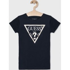 Guess Jeans - T-shirt dziecięcy 118-175 cm. Niebieskie bluzki dziewczęce Guess Jeans, z nadrukiem, z bawełny, z okrągłym kołnierzem, z krótkim rękawem, krótkie, bez kaptura. Za 79,90 zł.