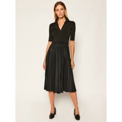 Sukienka koktajlowa Sportmax Code Vinci 73260106. Czarne sukienki damskie Sportmax Code, xs, bez wzorów, wizytowe, bez kołnierzyka, bez rękawów. Za 1749,00 zł.