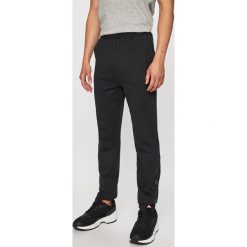 Hummel - Spodnie sportowe. Szare spodnie męskie Hummel, s, bez wzorów, z bawełny, sportowe. W wyprzedaży za 129,90 zł.