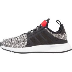 Adidas Originals X_PLR Tenisówki i Trampki core black/red. Czarne tenisówki męskie adidas Originals, z materiału. W wyprzedaży za 299,25 zł.
