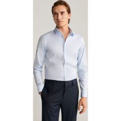 Mango Man - Koszula Emotion. Białe koszule męskie Mango Man, s, bez wzorów, z elastanu, eleganckie, z klasycznym kołnierzykiem, z długim rękawem. Za 199,90 zł.
