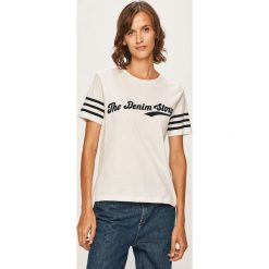 Jacqueline de Yong - T-shirt. Niebieskie bluzki damskie Jacqueline de Yong, s, z nadrukiem, z bawełny, z okrągłym kołnierzem, z krótkim rękawem. W wyprzedaży za 59,90 zł.