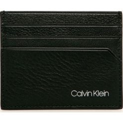 Calvin Klein - Portfel skórzany. Czarne portfele męskie Calvin Klein, bez wzorów, ze skóry. Za 229,90 zł.