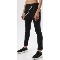 Czarne Spodnie Adrealin. Czarne spodnie damskie Born2be, xl, z dresówki. W wyprzedaży za 74,99 zł.
