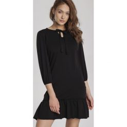 Czarna Sukienka Mereriena. Czarne sukienki damskie Renee, xl, bez wzorów, z dzianiny, bez kołnierzyka, bez rękawów. Za 79,99 zł.