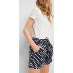 Szorty z wysokim stanem. Niebieskie szorty damskie Orsay, bez wzorów, z wiskozy, eleganckie, z podwyższonym stanem. Za 49,99 zł.