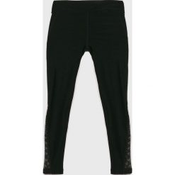 Guess Jeans - Legginsy dziecięce 118-175 cm. Czarne spodnie dziewczęce Guess Jeans, z aplikacjami, z elastanu. W wyprzedaży za 99,90 zł.