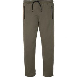 Spodnie sportowe bonprix ciemnooliwkowy. Zielone spodnie męskie bonprix, s, bez wzorów, sportowe. Za 74,99 zł.