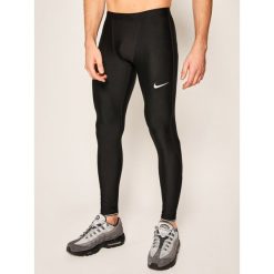 Legginsy NIKE AT4238. Czarne spodnie męskie Nike, s, bez wzorów, sportowe. W wyprzedaży za 149,00 zł.