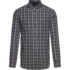 Koszula TOMMY HILFIGER Heather MW0MW11525. Niebieskie koszule męskie TOMMY HILFIGER, m, bez wzorów, z bawełny, casualowe, bez kołnierzyka, bez rękawów. W wyprzedaży za 209,00 zł.