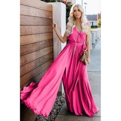 Sukienka ZINNIA PINK. Różowe sukienki damskie Sukienka ZINNIA PINK, s, bez wzorów, bez kołnierzyka, bez rękawów, długie. W wyprzedaży za 119,00 zł.