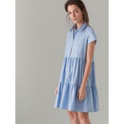 Bawełniana sukienka baby doll - Niebieski. Niebieskie sukienki damskie marki Mohito, bez wzorów, z bawełny, bez kołnierzyka, bez rękawów. Za 159,99 zł.