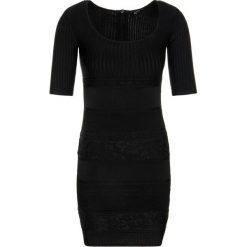Sukienka dzianinowa Marciano Guess 94G732 5036Z. Czarne sukienki damskie MARCIANO GUESS, m, z aplikacjami, z elastanu, bez kołnierzyka, bez rękawów. W wyprzedaży za 429,00 zł.