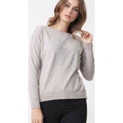 Beżowy Sweter City Of Home. Brązowe swetry damskie Born2be, xl, z aplikacjami, z jeansu, z długim rękawem, długie, bez kaptura. Za 69,99 zł.