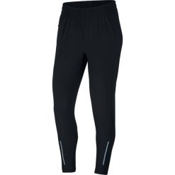 Spodnie Nike Swift Trousers W Czarne. Czarne spodnie damskie Nike, s, bez wzorów, z materiału, do biegania, dri-fit (nike). Za 239,99 zł.