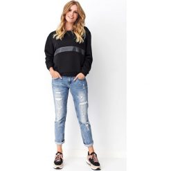 Bluza z koronką czarna - 36. Czarne bluzy damskie e-margeritka.pl, s, w koronkowe wzory, z bawełny, eleganckie, z krótkim rękawem, krótkie, bez kaptura. Za 149,99 zł.