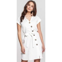 Kremowa Sukienka Ticklish. Brązowe sukienki damskie other, s, bez wzorów, eleganckie, z asymetrycznym kołnierzem, bez rękawów, mini, asymetryczne. Za 79,99 zł.