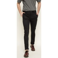 Dickies - Spodnie. Czarne spodnie męskie marki Dickies, na co dzień, bez wzorów, z elastanu, casualowe. W wyprzedaży za 179,90 zł.