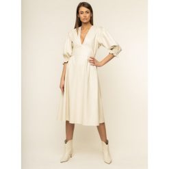 Sukienka skórzana MSGM 2841MDA192 207108. Brązowe sukienki damskie MSGM, bez wzorów, z poliesteru, bez kołnierzyka, bez rękawów. W wyprzedaży za 1709,00 zł.