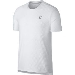Nike męska koszulka sportowa M NKCT Top SS Checkered BL White Black 2XL. Czarne koszulki męskie Nike, xl, bez wzorów, z poliesteru, bez kołnierzyka, bez rękawów, tenisowe. Za 179,00 zł.